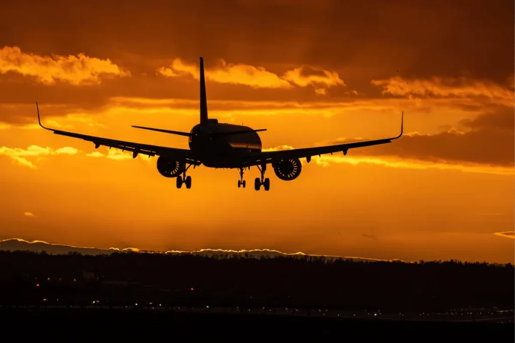 Traveler comparing flight options at an airport