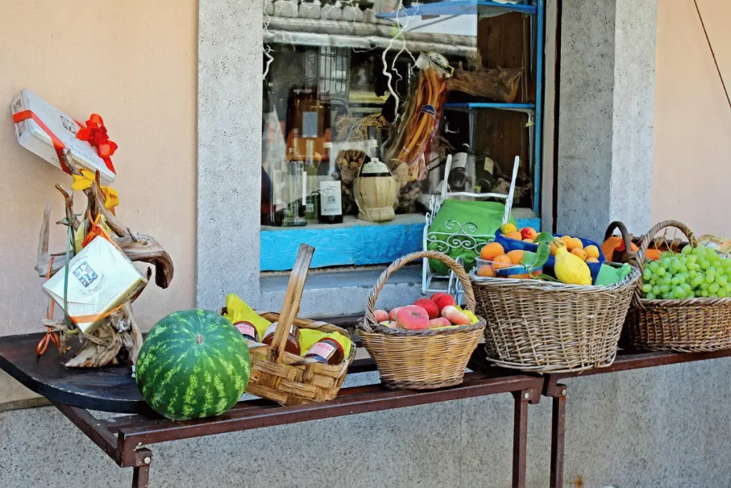 Travelers buying affordable local food at a market