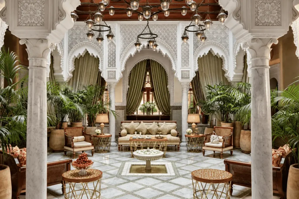 Private riad courtyard with a plunge pool and traditional Moroccan design at Royal Mansour Marrakech.