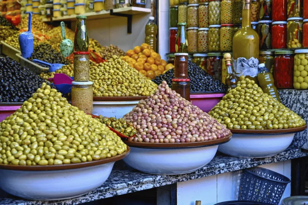 Traditional souks in Marrakech with colorful spices, lanterns and Moroccan crafts